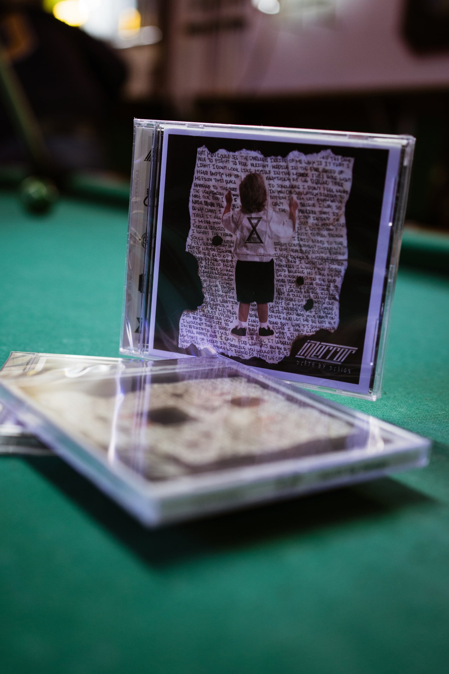 "Death by Design" Hard Copy CD