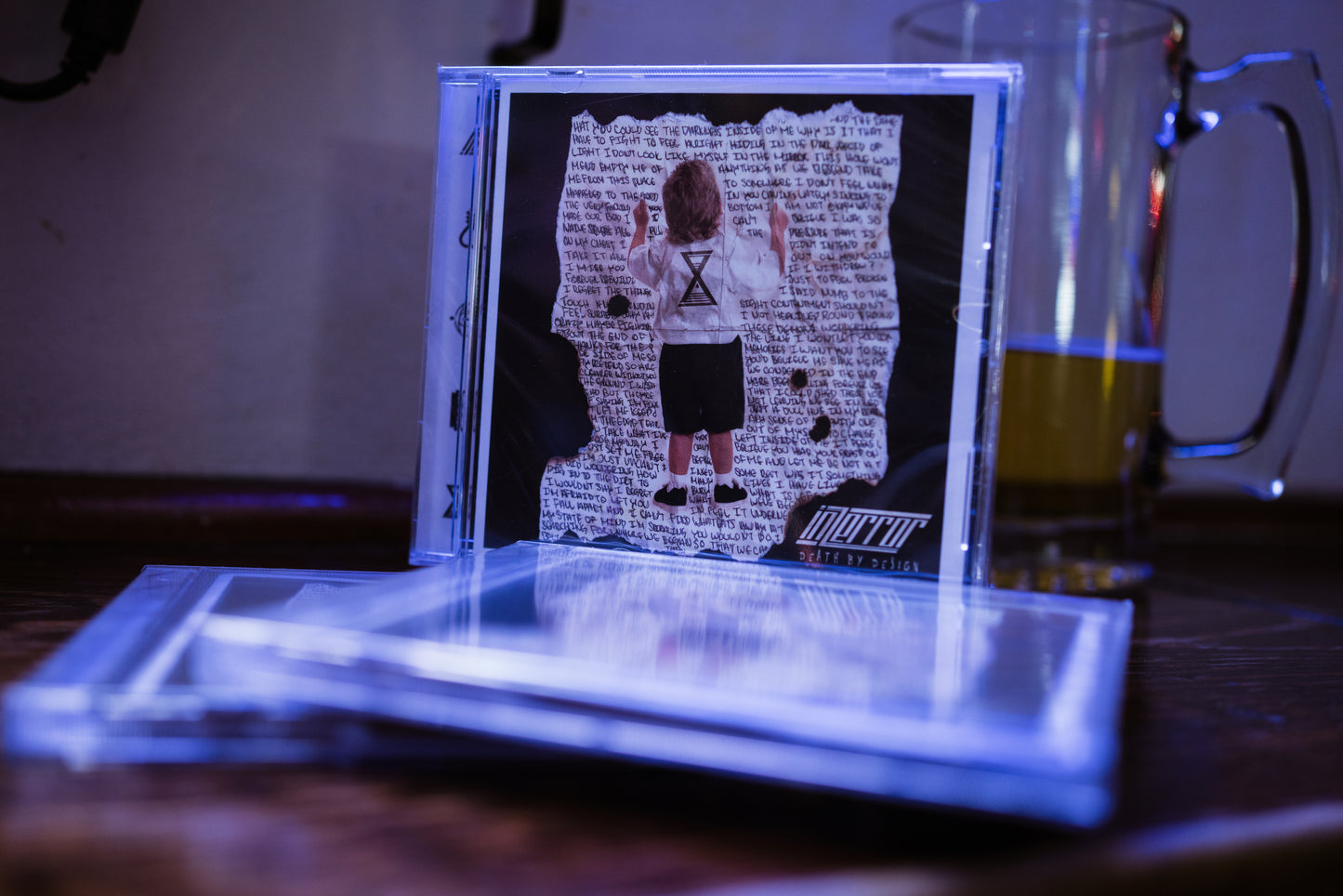 "Death by Design" Hard Copy CD