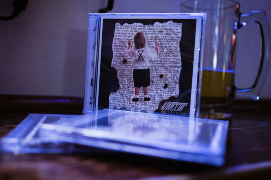 "Death by Design" Hard Copy CD